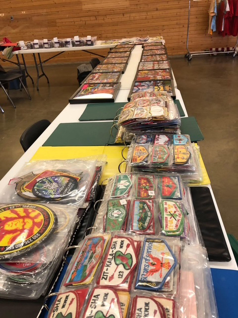 Vendor table set up to sell and trade patches.